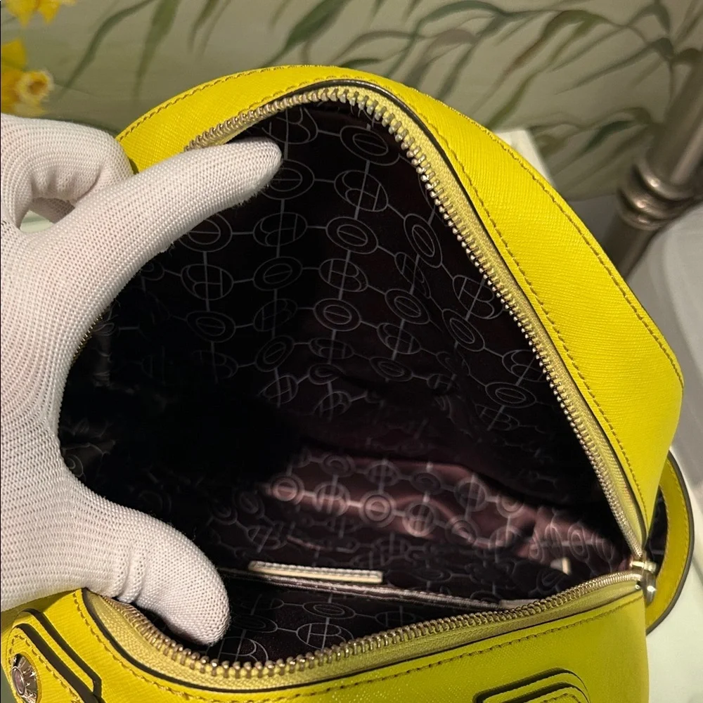 Henri Bendel West 57th Yellow Saffiano Leather Backpack with Colorful Tassels